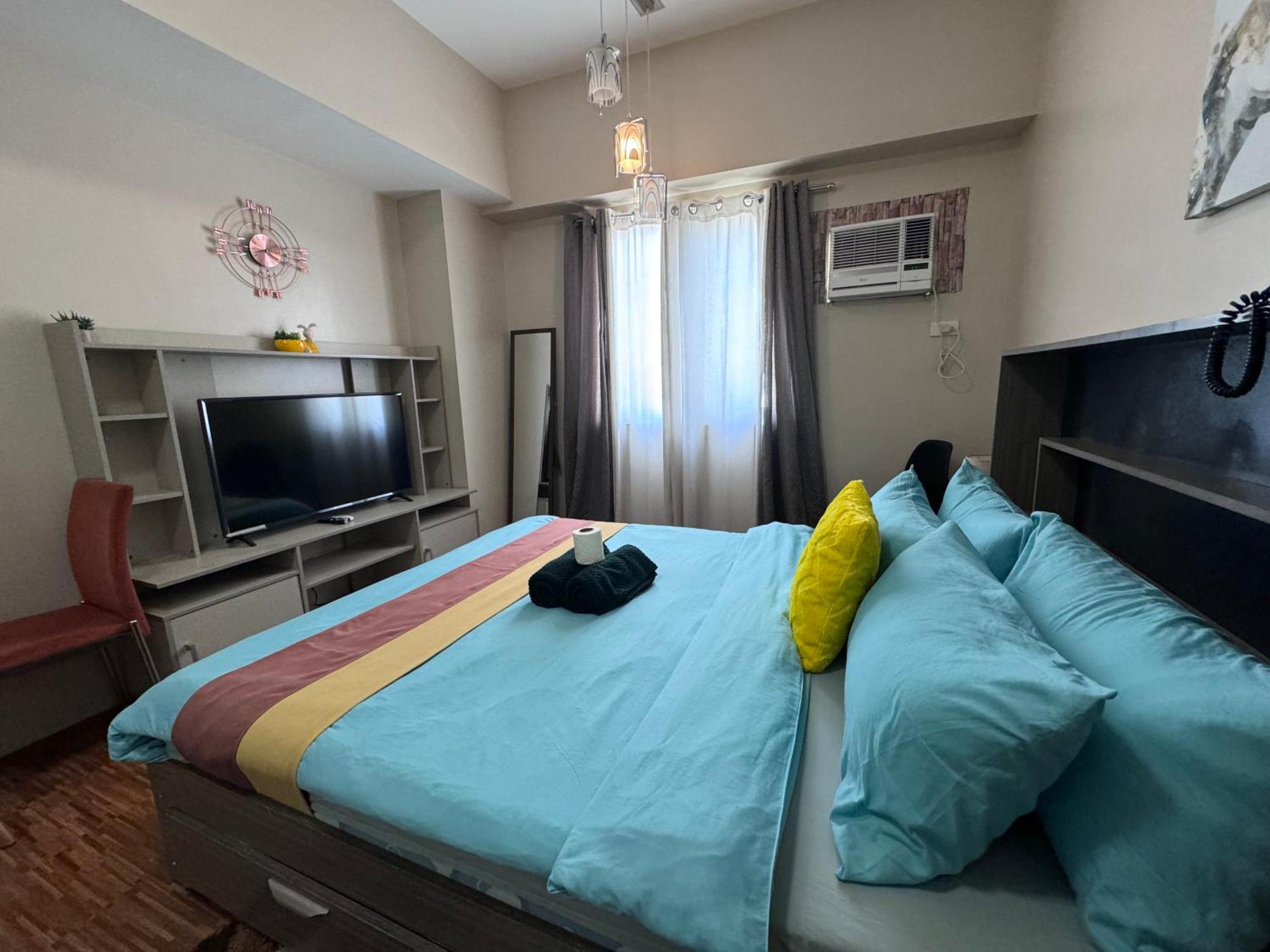 Luxanos Condo Place- Sunvida Tower Себу Экстерьер фото