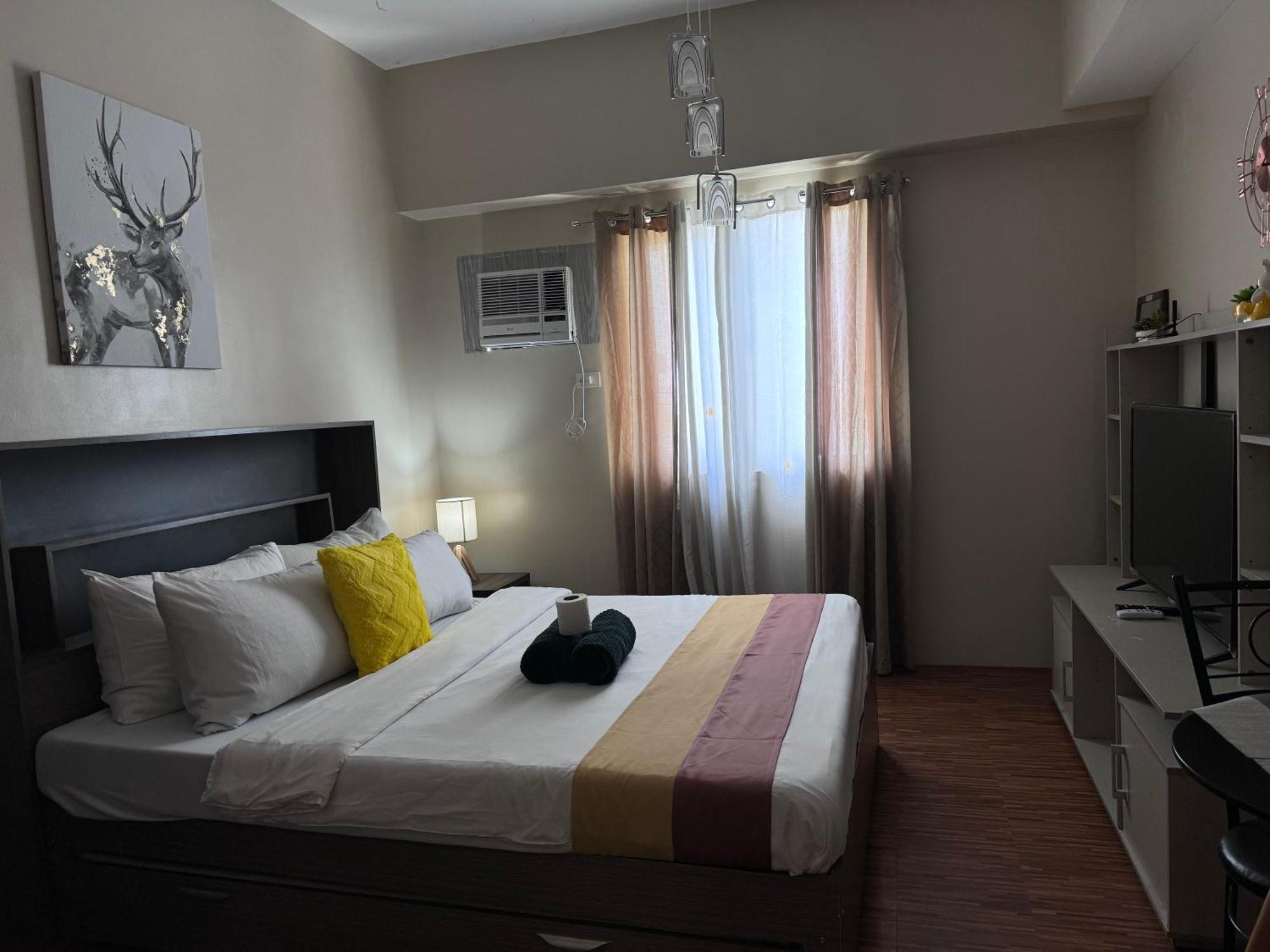 Luxanos Condo Place- Sunvida Tower Себу Экстерьер фото
