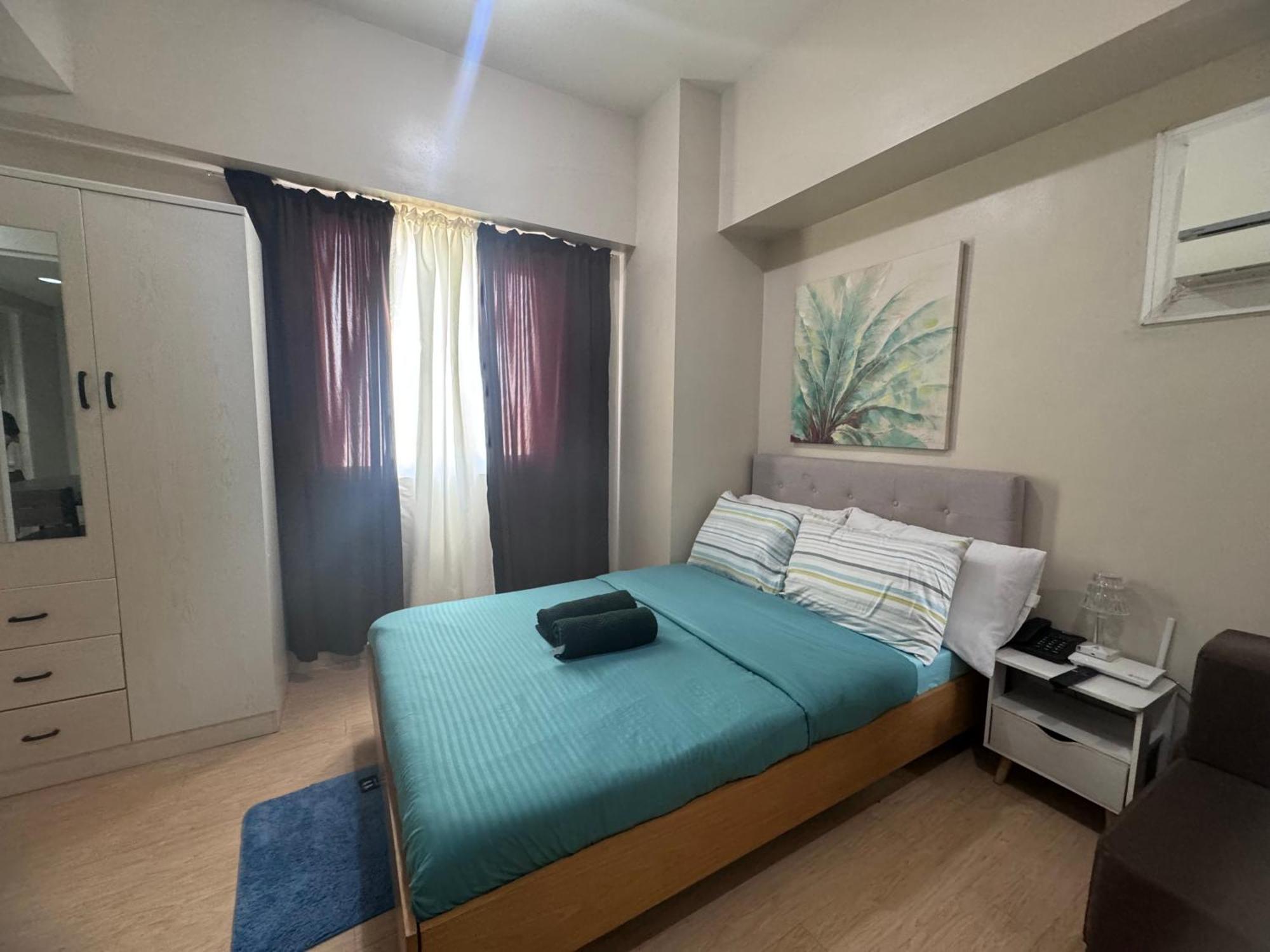 Luxanos Condo Place- Sunvida Tower Себу Экстерьер фото