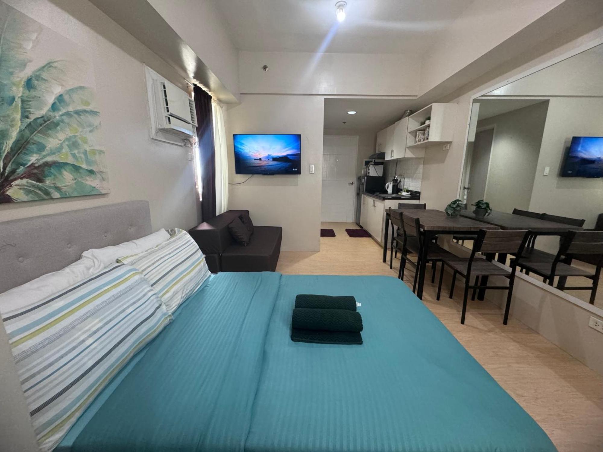 Luxanos Condo Place- Sunvida Tower Себу Экстерьер фото