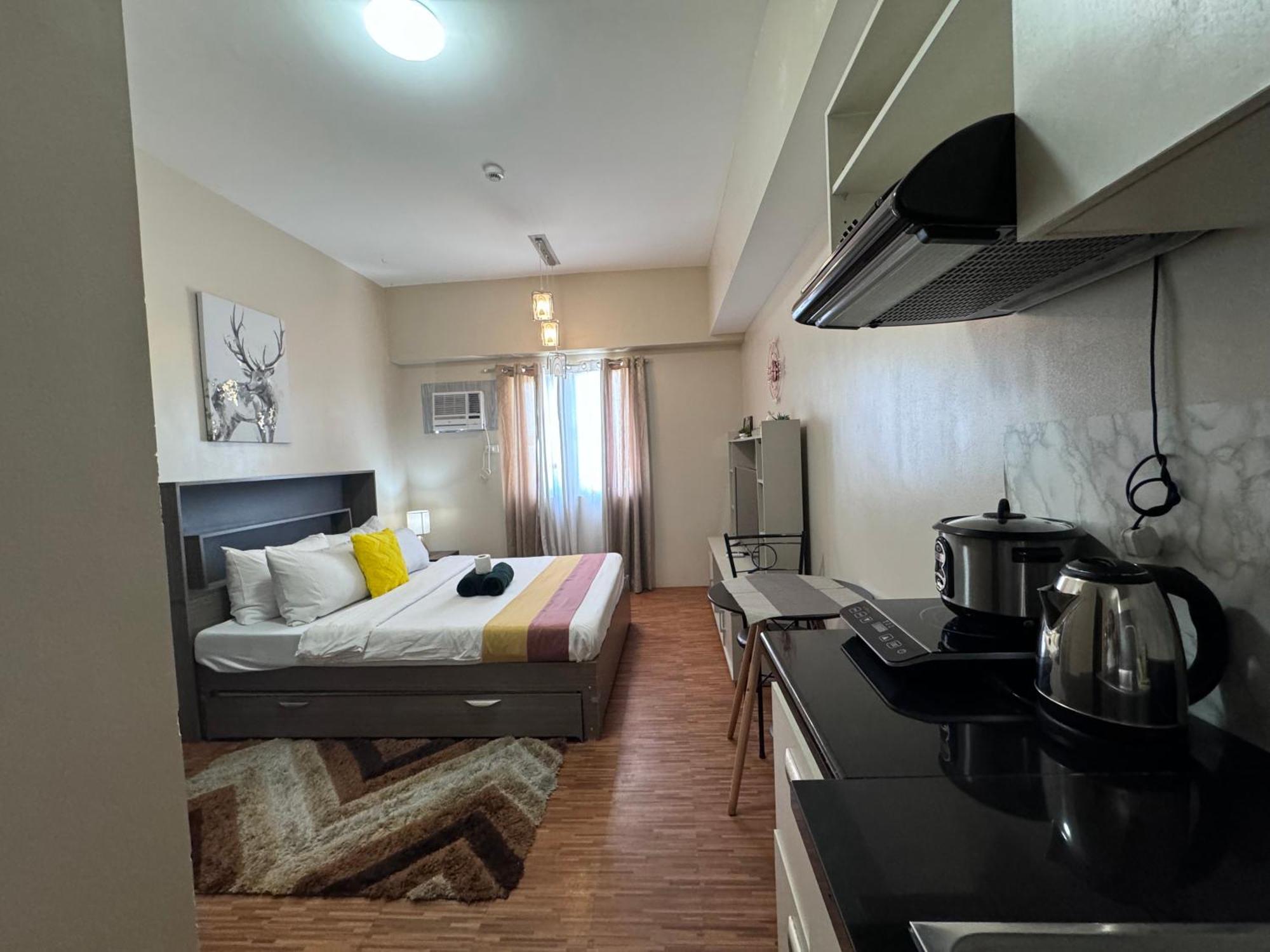 Luxanos Condo Place- Sunvida Tower Себу Экстерьер фото