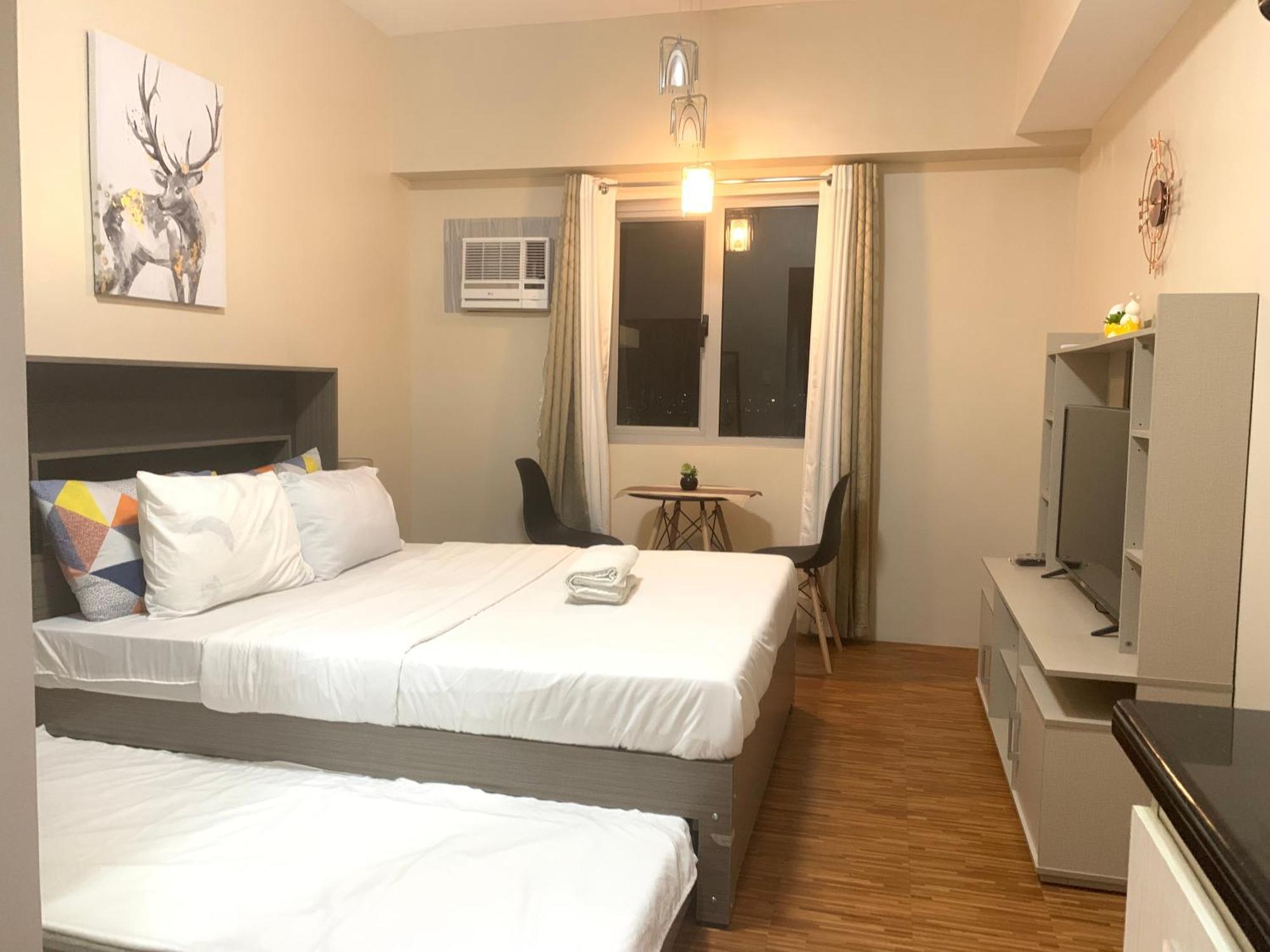 Luxanos Condo Place- Sunvida Tower Себу Экстерьер фото