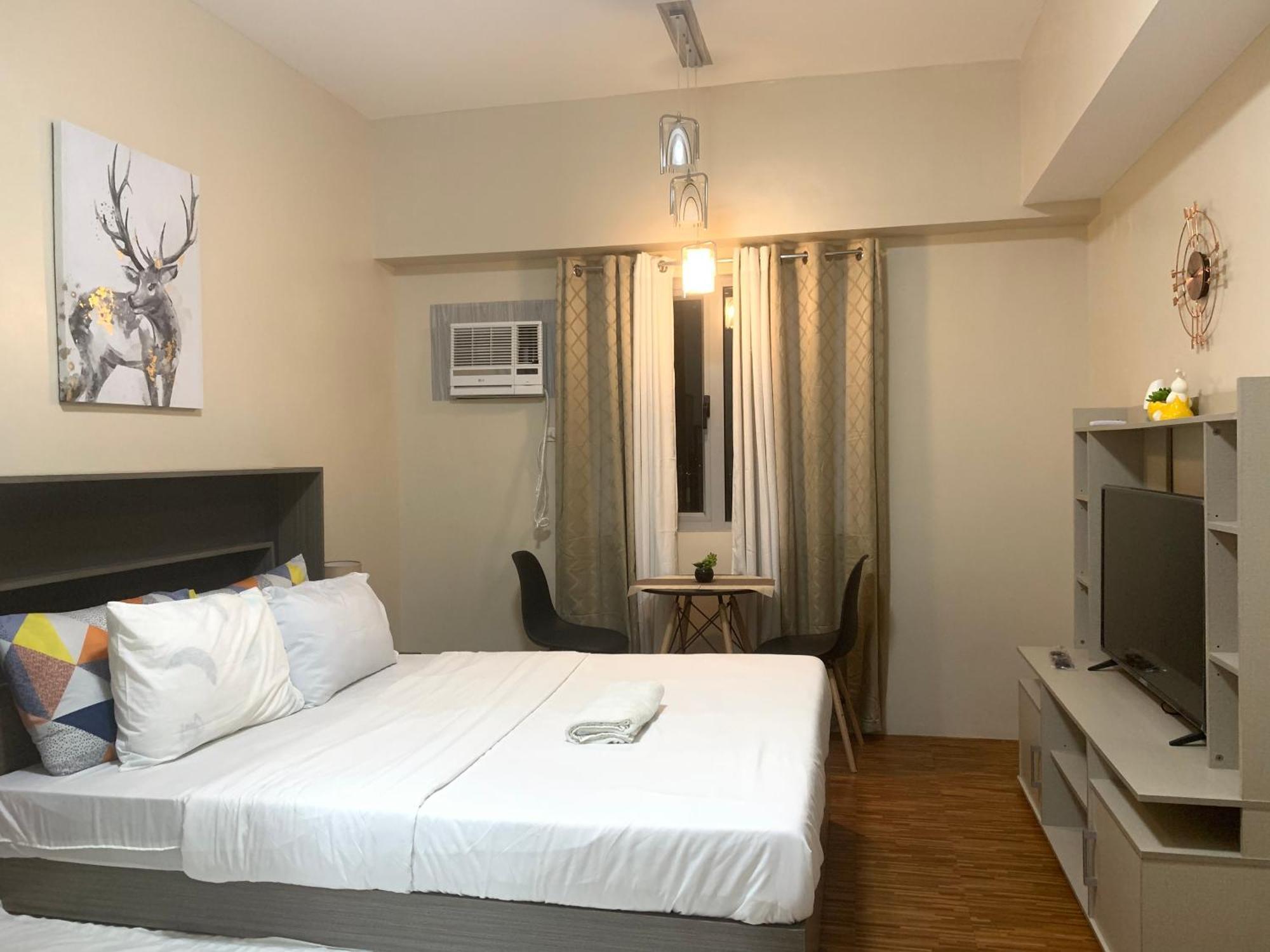 Luxanos Condo Place- Sunvida Tower Себу Экстерьер фото